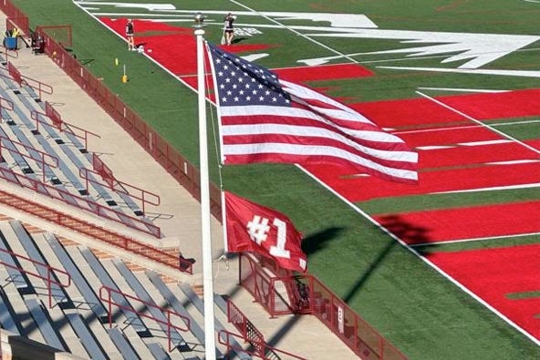 USA flag with #1 flag at DU's soccer field