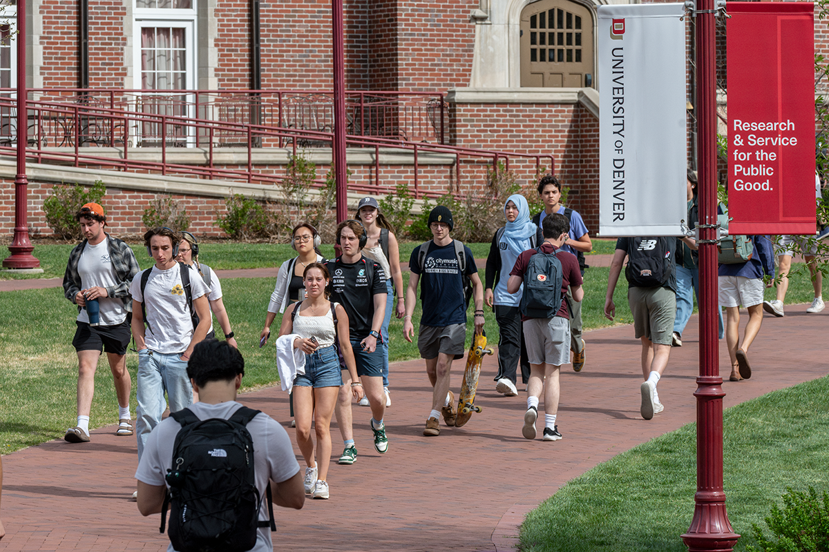 DU students walking on campus