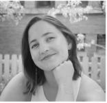 Anna smiling with hand on chin