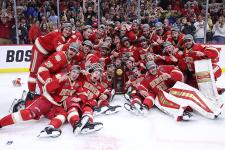 The DU hockey team poses for a photo after winning the national championship.