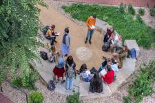 DU students in class outside.