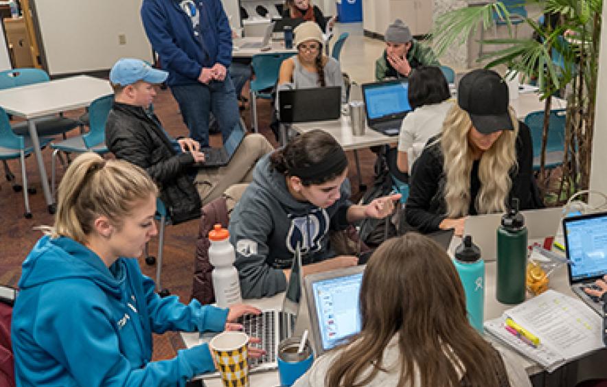 graduate classroom working in groups