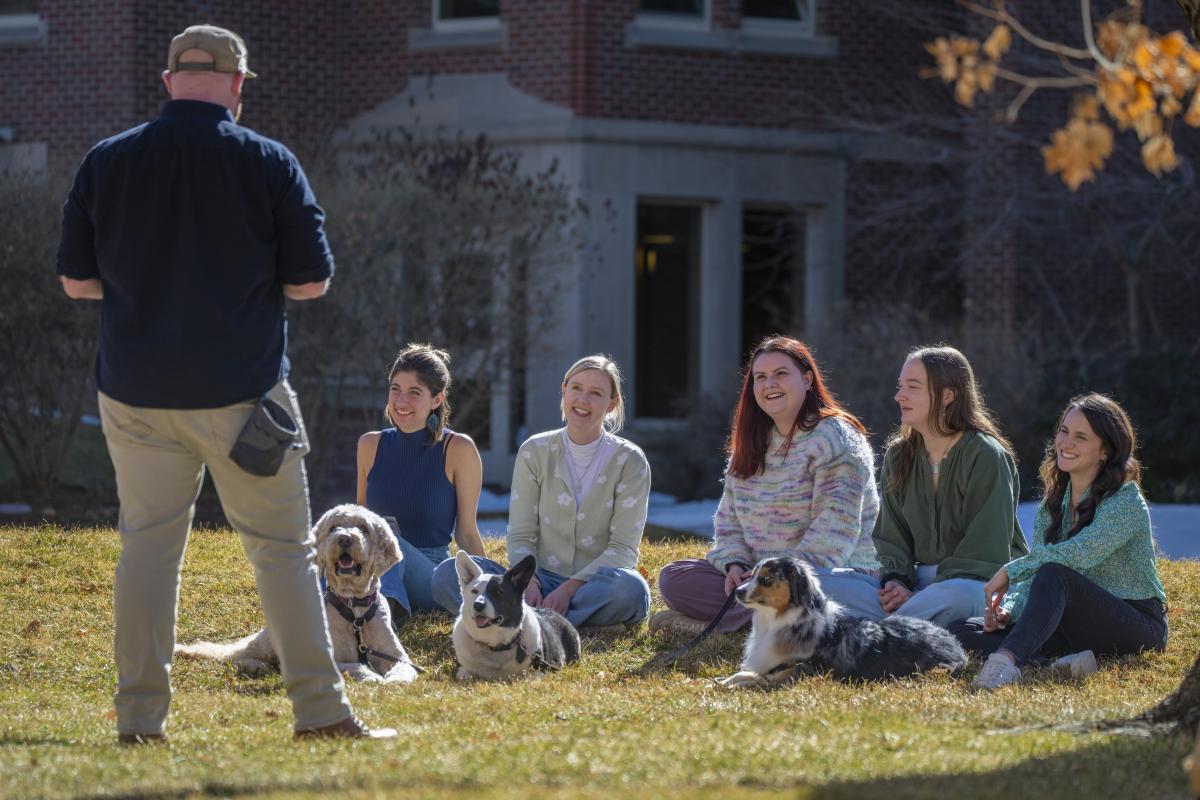 students outside with dogs