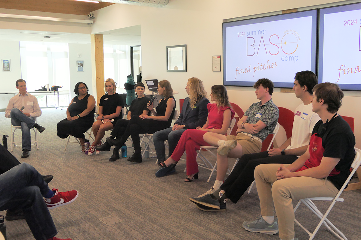 The 2024 BASE Camp cohort sits for a panel discussion at the Final Pitch