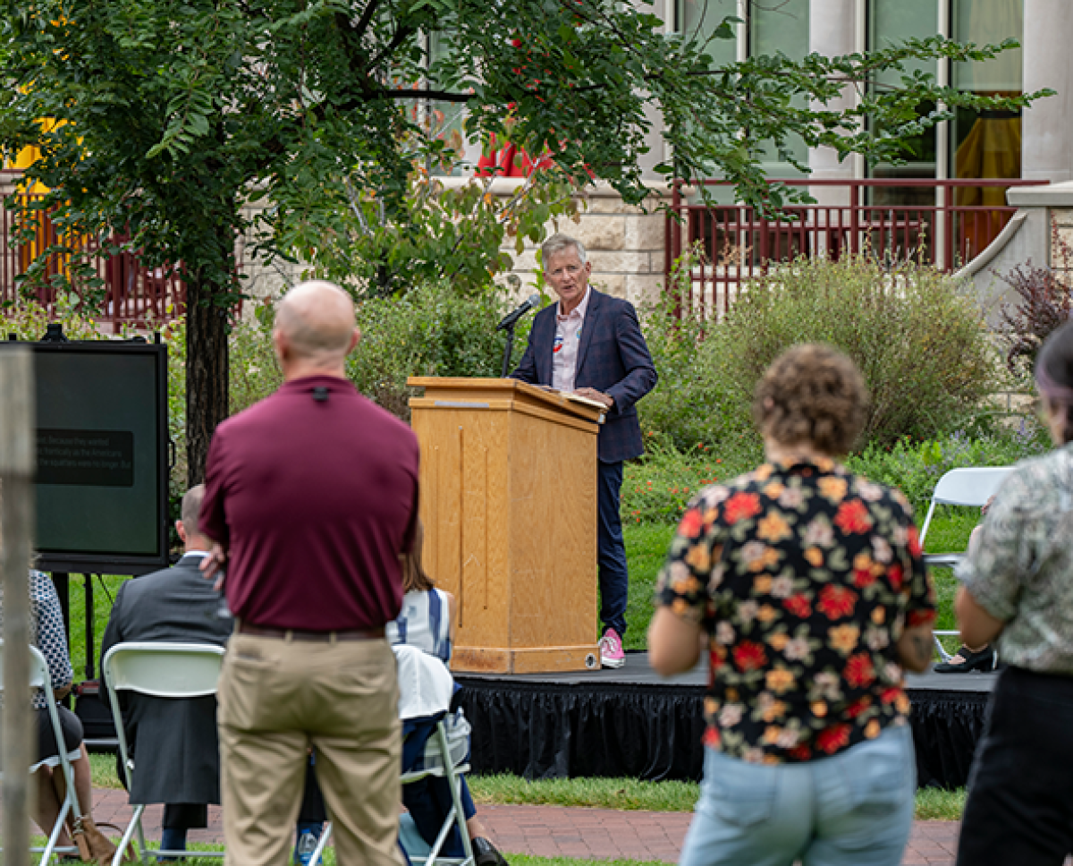 Chancellor Jermey Haefner reading from the Grapes of Wrath, a banned book, during a Constitution Day Event