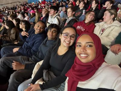 A selfie with students at a DU hockey game.