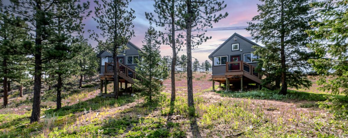 two cabins on DU's Kennedy Mountain Campus