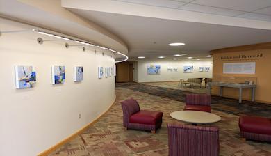 An image of artwork on the walls inside Anderson Academic Commons at the University of Denver.