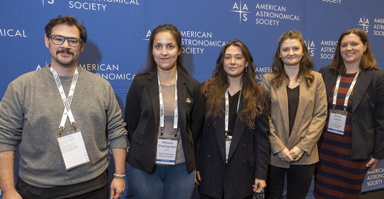 Researchers studying WR140 pose for a photo after the press conference.