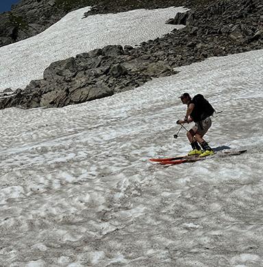 Nolan Deck skies down the mountain.