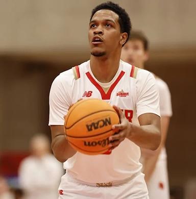 DU men's basketball player Tommy Bruner prepares to shoot a free throw.
