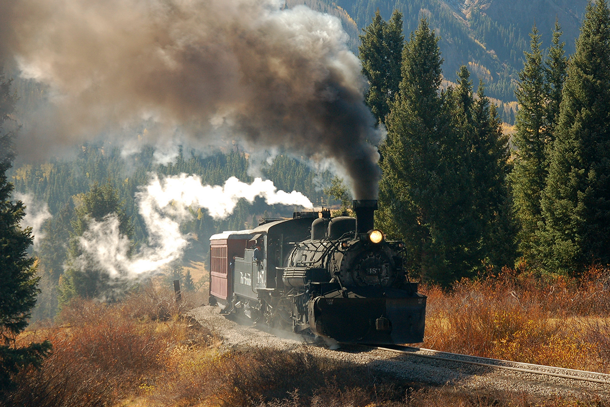 The Cumbres and Toltec Scenic Railroad blowing steam and smoke